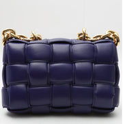Borsa a tracolla Bottega Veneta Cassette in pelle intrecciata viola
