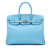 Hermès
Celeste Epsom and Bleu Mykonos Verso Candy Birkin 35 Palladium Hardware, 2011