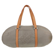 Borsa da viaggio Louis Vuitton Attaquant in tela beige e pelle naturale