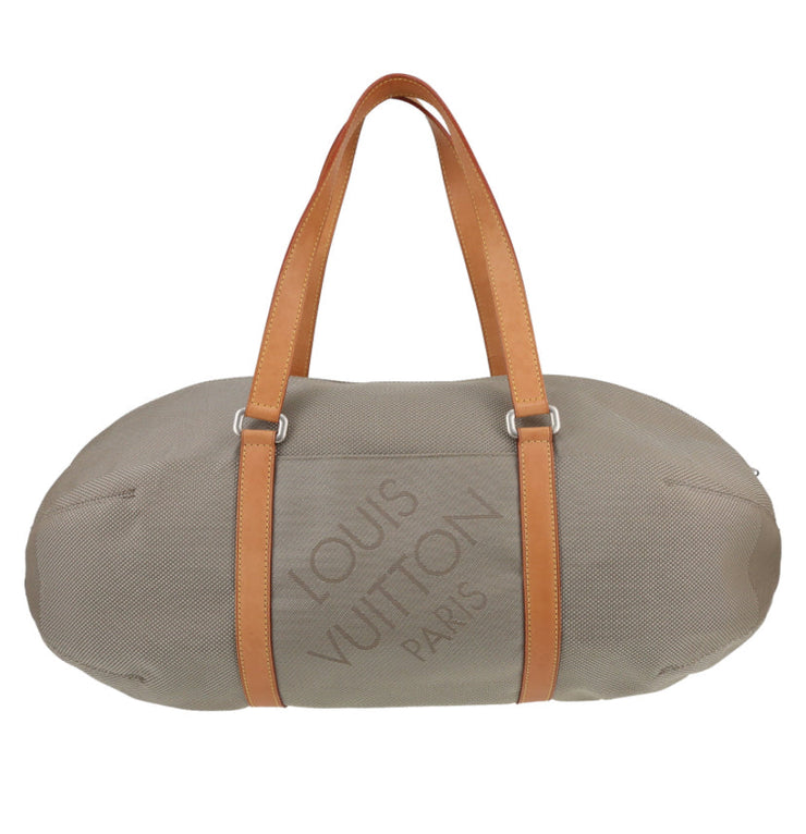 Borsa da viaggio Louis Vuitton Attaquant in tela beige e pelle naturale