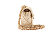 Chanel
Metallic Gold Quilted Lambskin Mini Flap Gold Hardware, 1994-1996