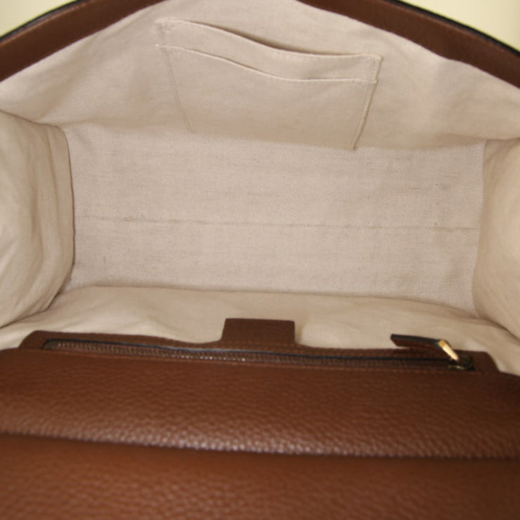 Borsa Gucci GG Marmont in pelle martellata marrone