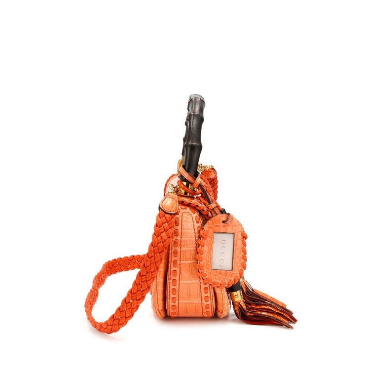 Gucci
Orange Crocodile Whipstitch Medium New Bamboo 1921 Top Handle Bag Gold Hardware, 2011