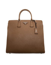 PRADA | RE-NYLON VEST, POPLIN TIE, BLACK SHIRT, CASHMERE AND WOOL VEST WORN BY AUGUSTUS TRAUMANIS