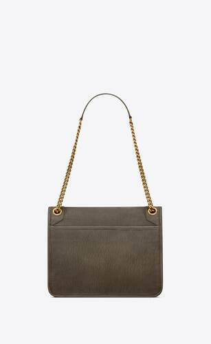 NIKI MEDIA IN PELLE DI AGNELLO MARTELLATA