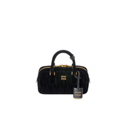 Borsa Arcadie in velluto con lavorazione matelassé