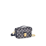 M22834 Pochette Métis East West